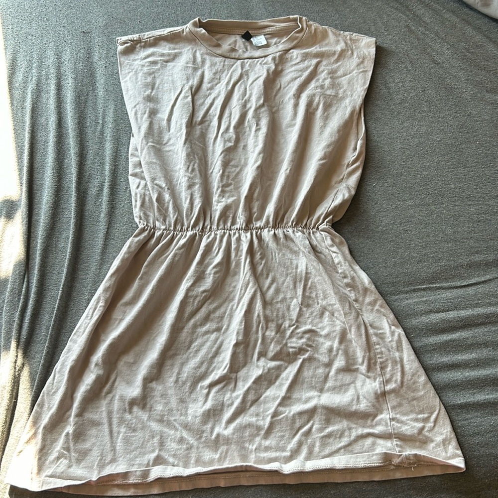 divided sleeveless tan short dress